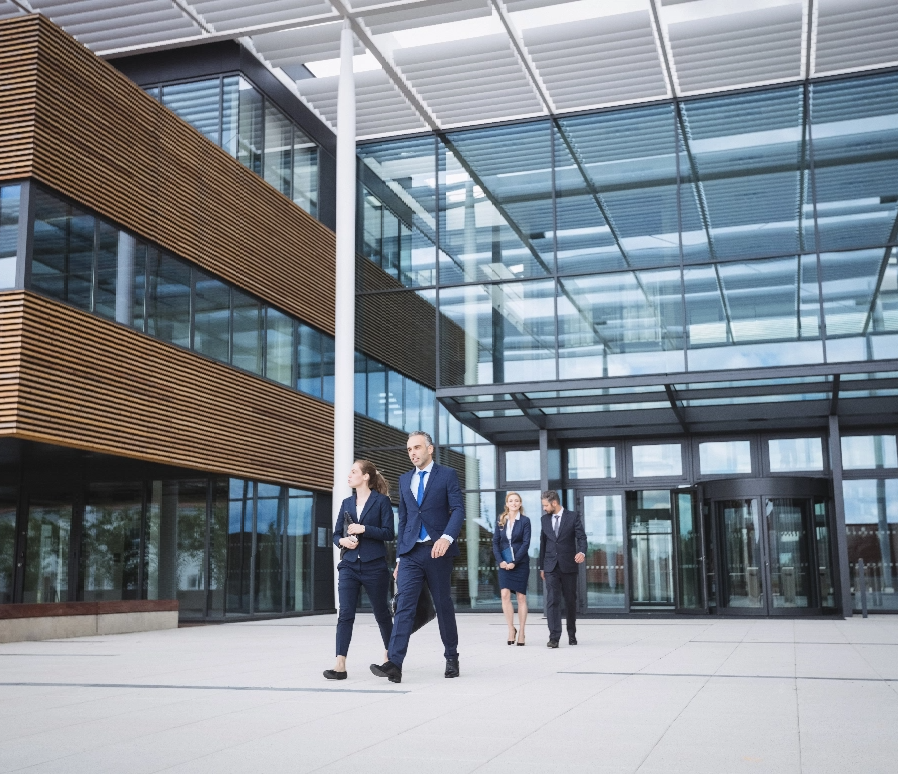 business-people-walking-outside-office